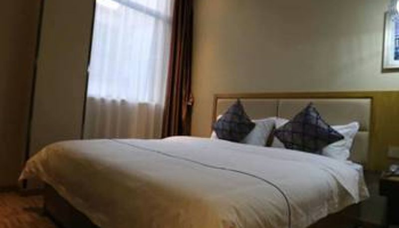 Zimmer - Bainianhui Yufa Chain Hotel Xinghai Square