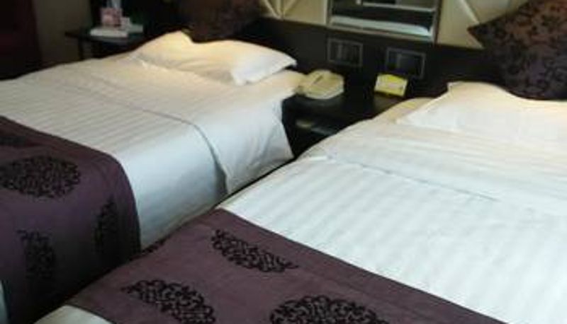 Zimmer - 东营新浪潮精品酒店(府前大街店)