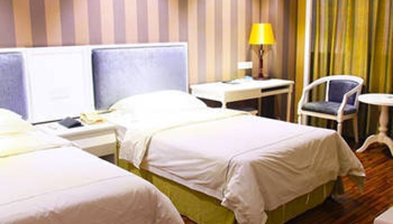 Zimmer - Zhongxun Hotel (Luoyang Railway Station Subway Station Branch)