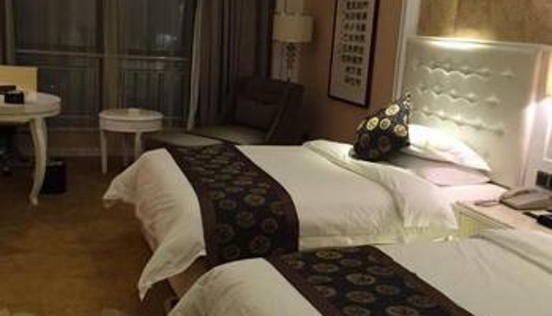 Zimmer - Emgrand International Hotel