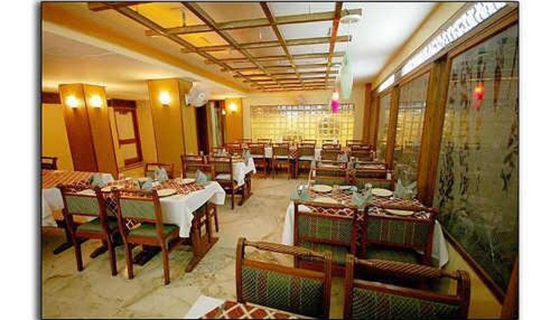 Breakfast room within the restaurant - Hotel Suncity International