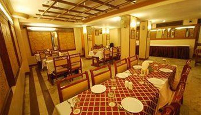Breakfast room within the restaurant - Hotel Suncity International