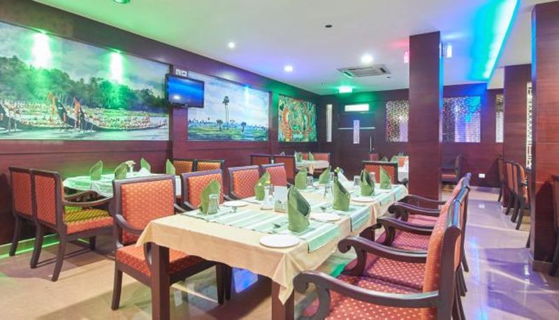 Sala śniadaniowa w restauracji - Hotel Nila Residency