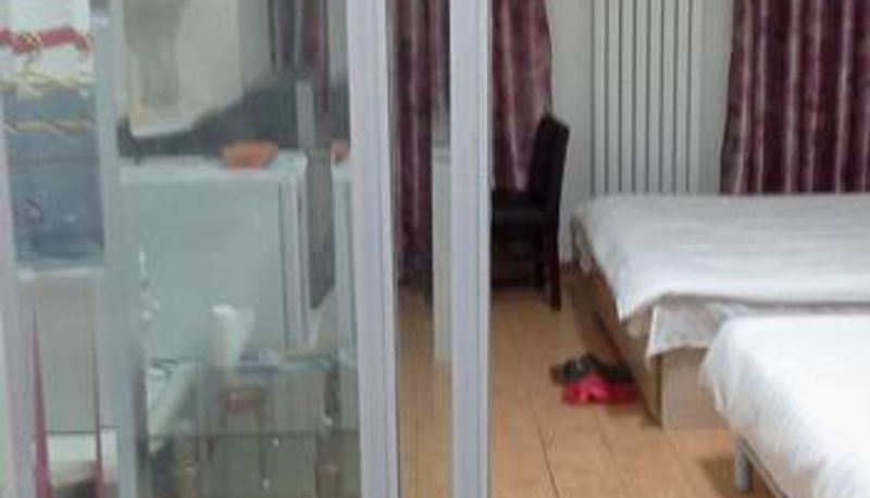 Kamer - Niuniu Apartment Hotel