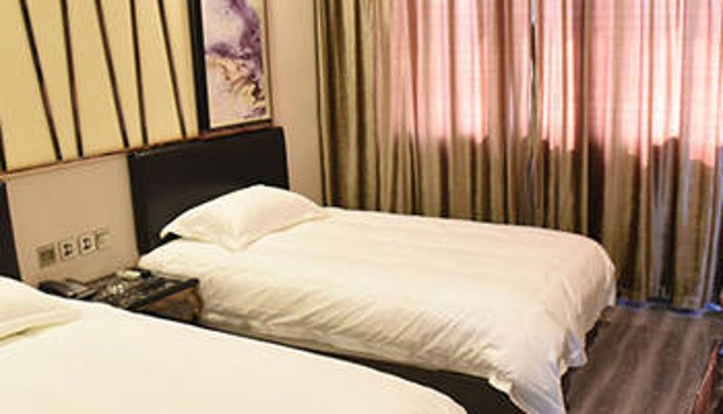 Zimmer - Kaiyue Hotel