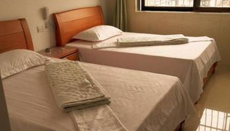 Zimmer - Haikou Laoxiong Inn