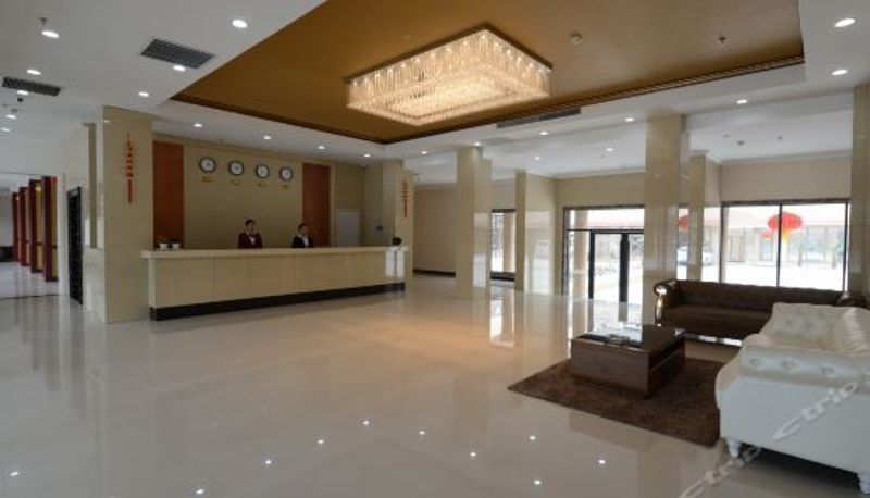 Rezeption - Xinyue Holiday Hotel