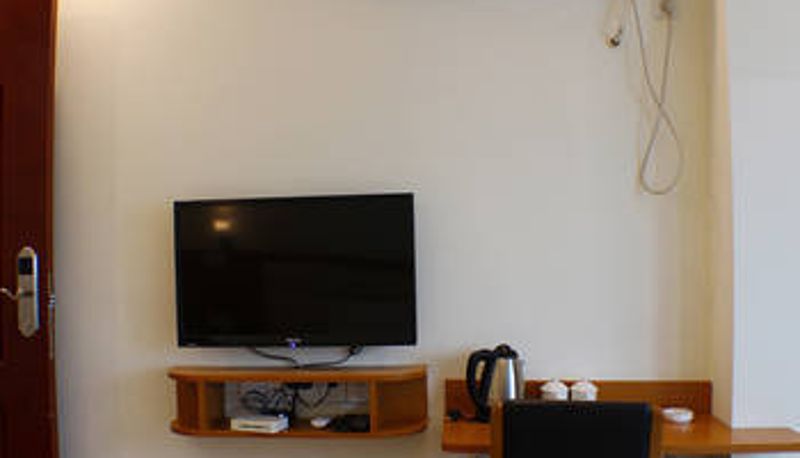 Zimmer - Huahuitong Business Hotel (high-speed railway station store)