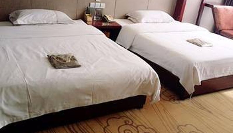 Zimmer - Guanghui Hotel (formerly Xinghewan Hotel)
