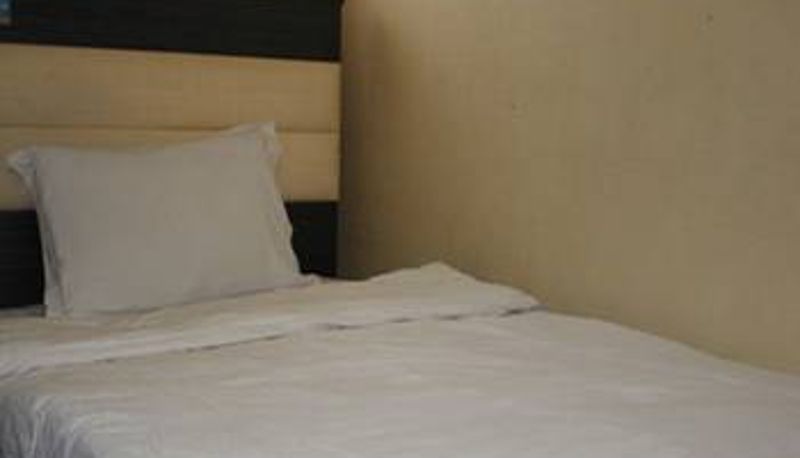 Zimmer - Xiongfeng Chain Hotel (Shuguang Hospital East Gate Fashion Store)