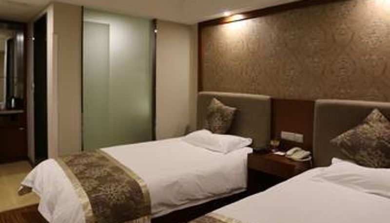 Zimmer - Longyi Business Hotel (Cangnan EMU Station Store)