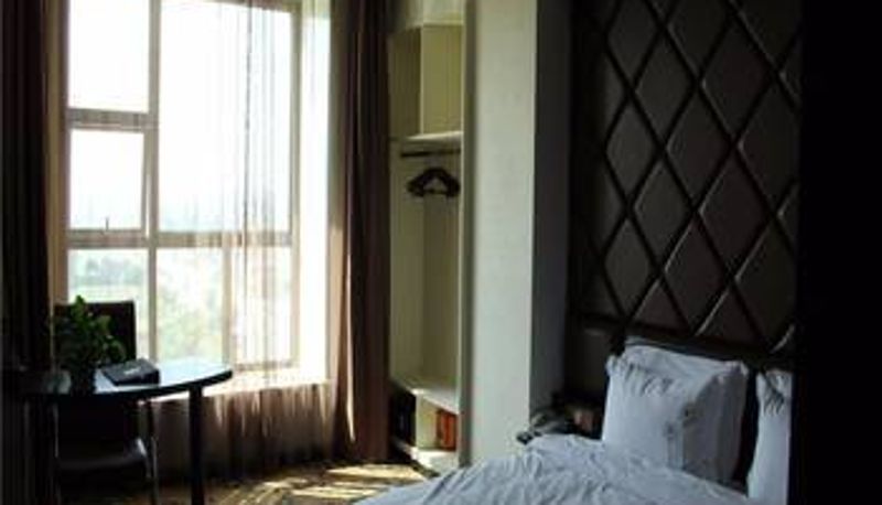Habitación - Gold Dragon Harbour Hotel