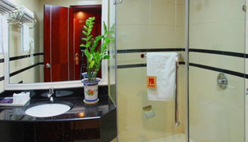 Habitación - Golden Bauhinia Hotel
