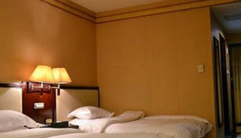 Habitación - Golden Bauhinia Hotel