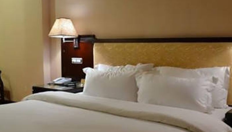 Habitación - Golden Bauhinia Hotel