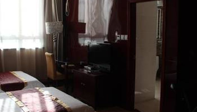 Habitación - Jiatianxia Business Hotel
