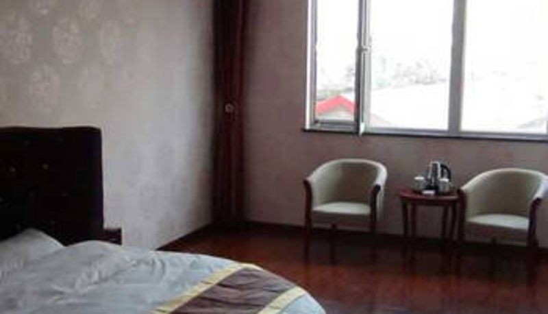 Habitación - Wanjiarong Hotel (Runyu Home Furnishings Store)