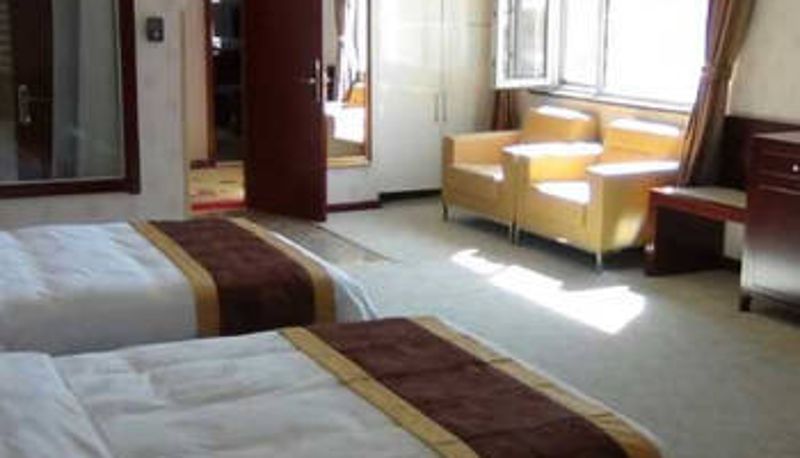 Habitación - Wanjiarong Hotel (Runyu Home Furnishings Store)