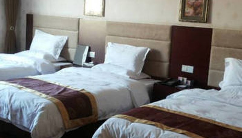 Habitación - Wanjiarong Hotel (Runyu Home Furnishings Store)