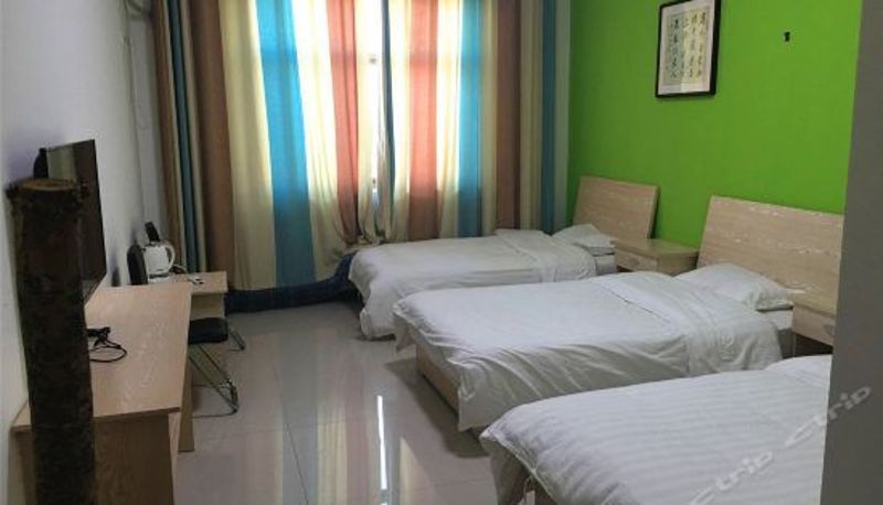 Chambre triple - Dandelion Hotel
