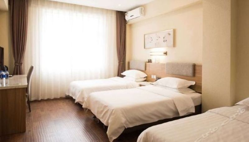 Tripla - Haixing Business Hotel
