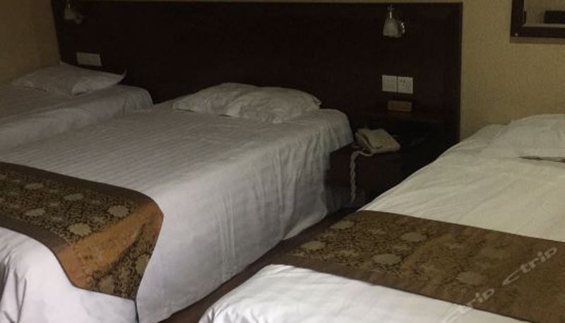 Dreibettzimmer - Kunlun Business Hotel