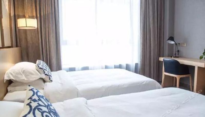 Camera superior - Guojin Xiyue Hotel