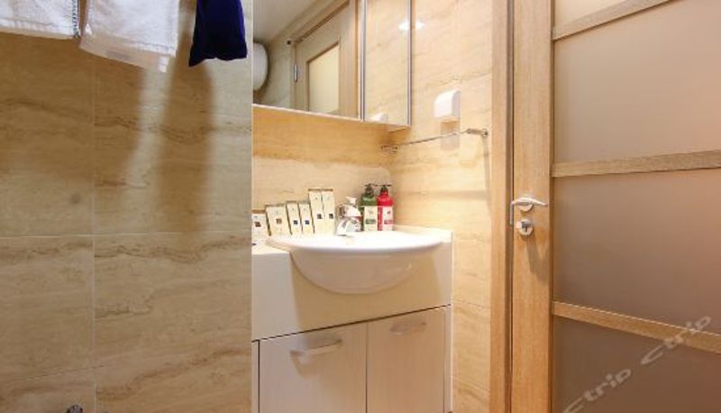 Habitación familiar - Sweetome Vacation Rental (Qingdao Vanke Golden Plaza)