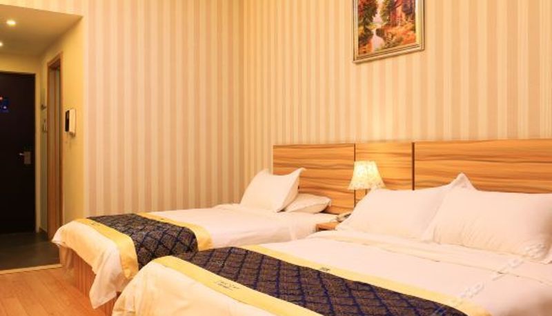 Habitación familiar - Sweetome Vacation Rental (Qingdao Vanke Golden Plaza)