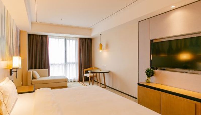Zimmer mit Flussblick - Suining International Convention and Exhibition Center) Bokai Landscape Hotel (Wanda Plaza Shop