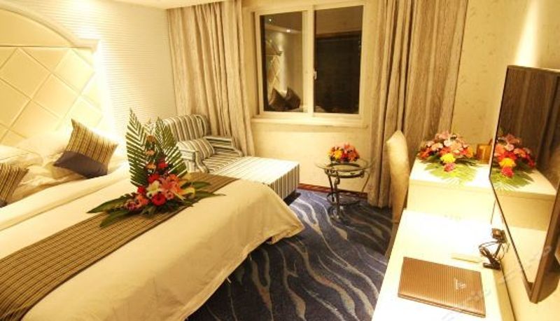 Habitación corporativa - Manhattan International Business Hotel Panzhihua