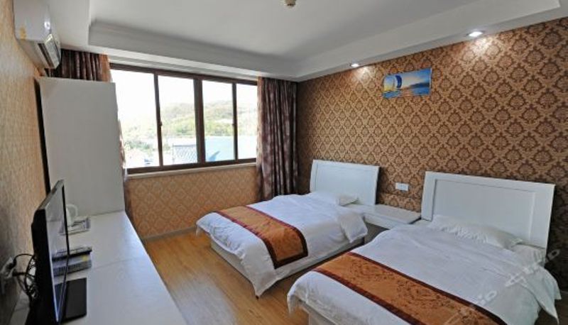 Camera superior - Xiongdi Shanzhuang Hotel
