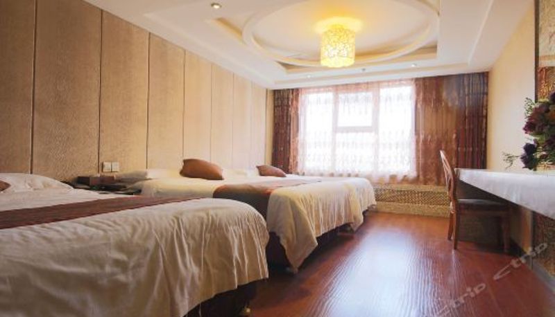Dreibettzimmer - Tropical Rain Forest Business Hotel