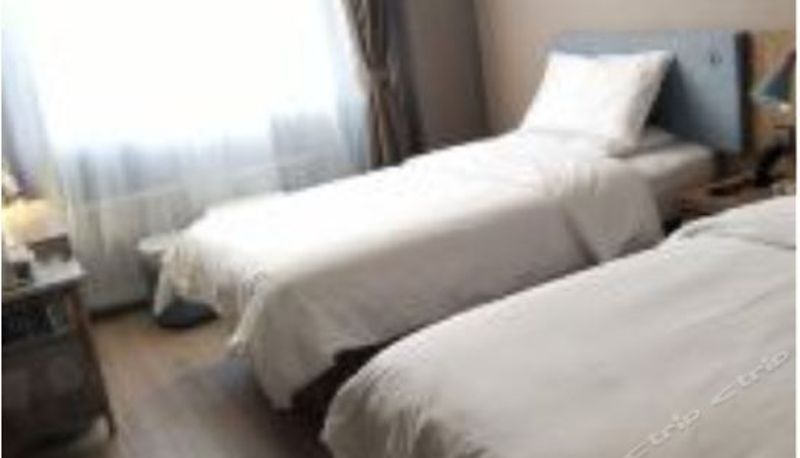 Standardzimmer - Home Inn (Huhehot Zhelimu Road)