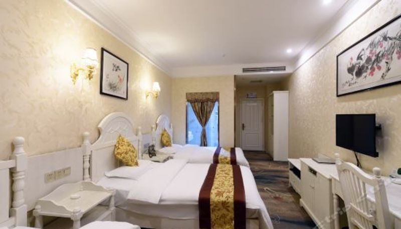 Dreibettzimmer - Yijiayi Hotel