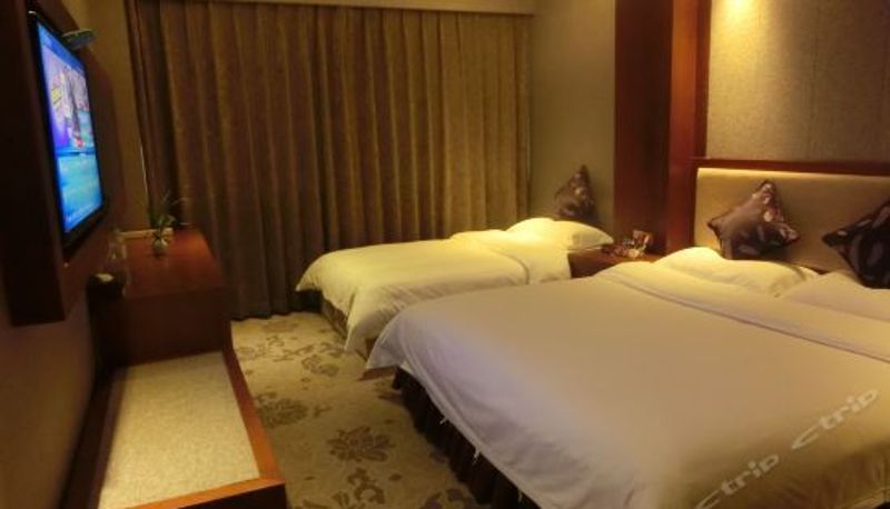 Camera superior - Junyi Holiday Hotel