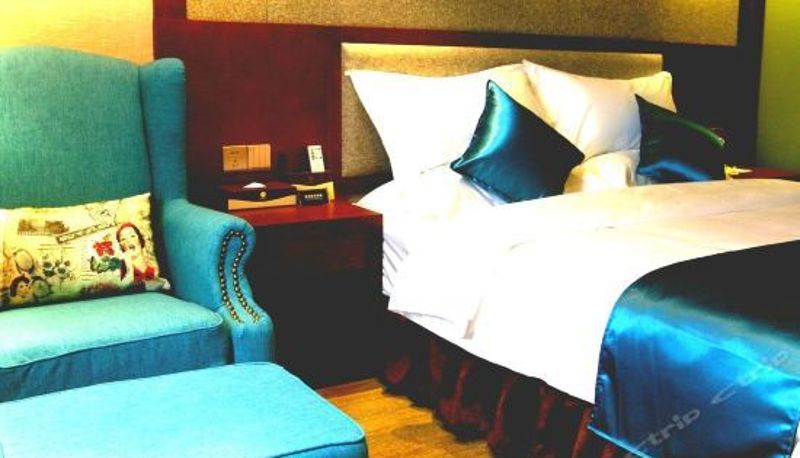 Camera superior - Junyi Holiday Hotel