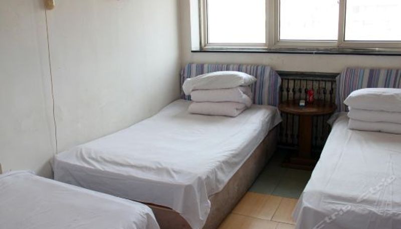 Dreibettzimmer - 烟台青年旅馆