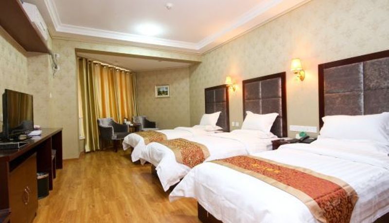 Dreibettzimmer - Xi'an Mingli Hotel