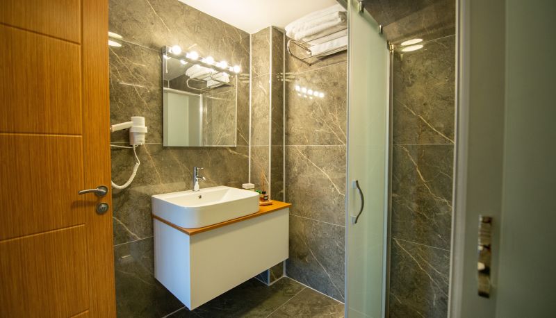 Badezimmer - BIG POINT HOTEL