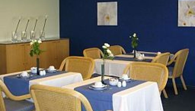 Sala śniadaniowa w restauracji - B-aparthotel Moretus