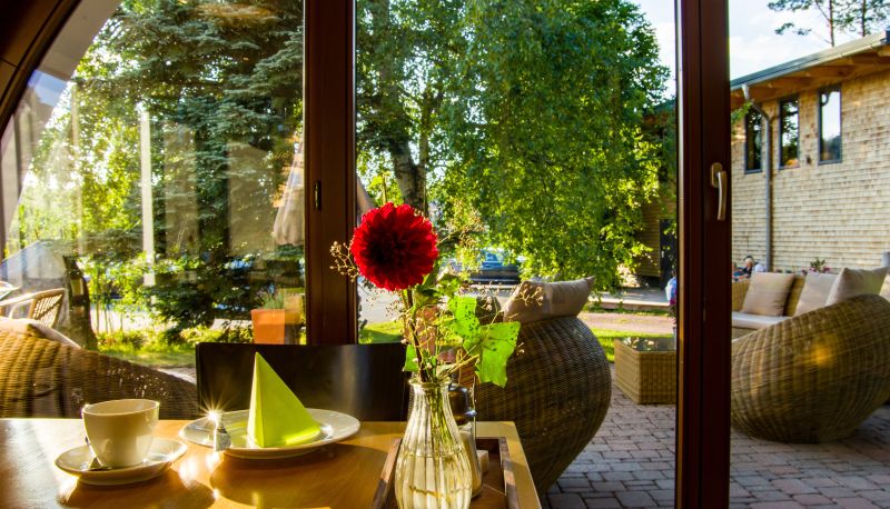 Salle de petit-déjeuner - Hotel Café Schoren