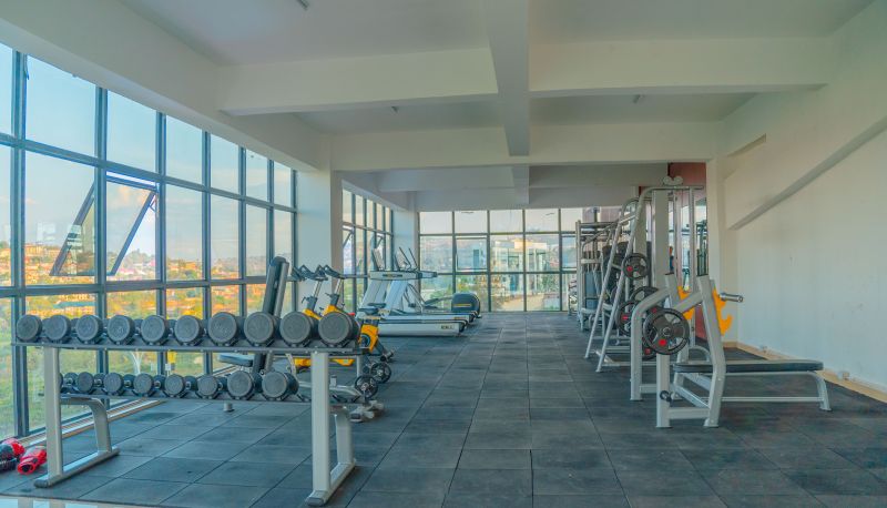 Fitnessraum - M APARTMENT & HOTEL
