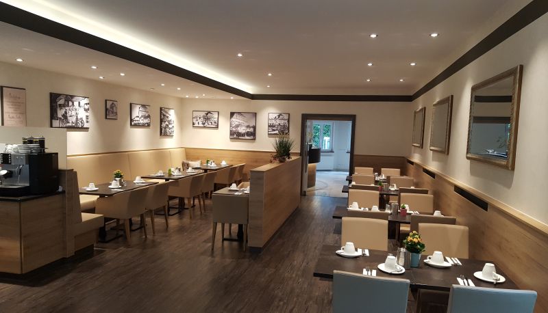 Salle de petit-déjeuner - Hölzl Appartement-Hotel
