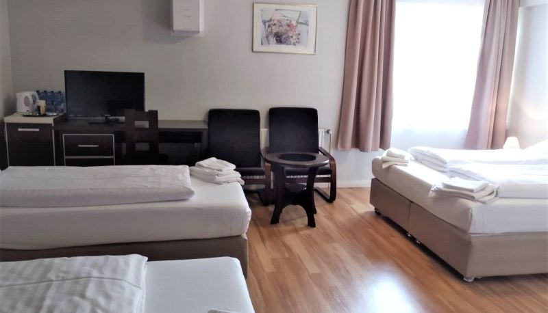 Quadruple room - M&A Cityhotel Hildesheim