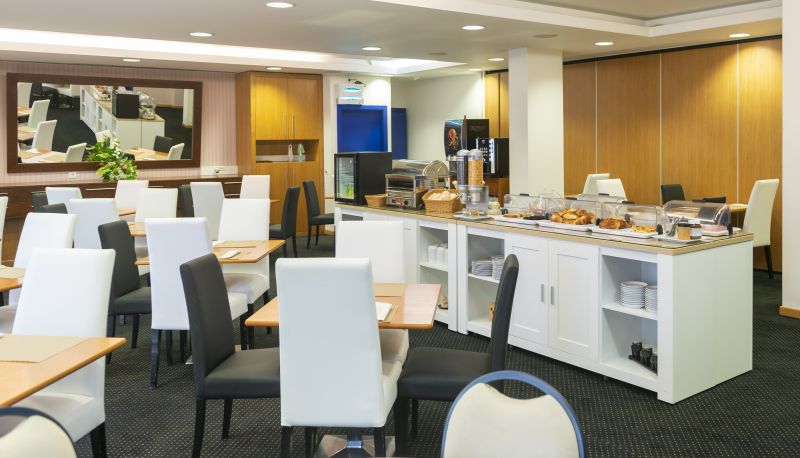 Salle de petit-déjeuner - Eurosol Residence Aparthotel