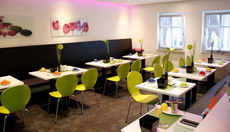 Frühstücksraum innerhalb des Restaurants - Vicus Pension