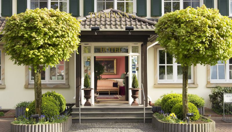 Buitenruimte van het hotel - Tiemanns Hotel