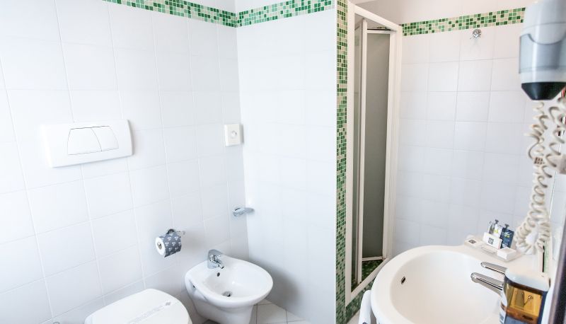 Badezimmer - Hotel Mosaico & Residence