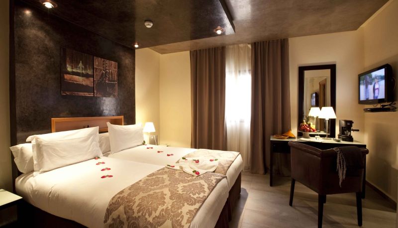 Habitación - Dellarosa Hotel & Suites